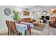 Bright dining area with a wooden table and chairs at 14022 Passage Way, Seminole, FL 33776