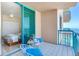 Cozy balcony setting, overlooking the ocean, complete with seating and refreshments at 1520 Gulf Blvd # 1602, Clearwater Beach, FL 33767