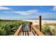 Scenic beach access with wooden boardwalk leading to sandy shores and the calming ocean view at 1520 Gulf Blvd # 1602, Clearwater Beach, FL 33767