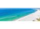 Stunning aerial view of the turquoise ocean and white sandy beach, perfect for relaxation and recreation at 1520 Gulf Blvd # 1602, Clearwater Beach, FL 33767