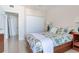 Bright bedroom featuring a queen-size bed, neutral walls, and a spacious closet at 1520 Gulf Blvd # 1602, Clearwater Beach, FL 33767