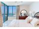 Bright bedroom with ocean views, natural light, and stylish decor creating a serene atmosphere at 1520 Gulf Blvd # 1602, Clearwater Beach, FL 33767