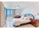 Comfortable bedroom featuring a queen-size bed, natural light, and serene ocean views at 1520 Gulf Blvd # 1602, Clearwater Beach, FL 33767