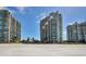 Beautiful beachfront condominiums with a picturesque view of white sandy shores and clear blue skies at 1520 Gulf Blvd # 1602, Clearwater Beach, FL 33767
