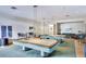 The community game room features two billiard tables and comfortable seating at 1520 Gulf Blvd # 1602, Clearwater Beach, FL 33767