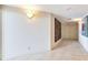 Hallway with tiled floor and an exit sign above a set of double doors at 1520 Gulf Blvd # 1602, Clearwater Beach, FL 33767
