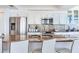 Well-equipped kitchen featuring granite countertops, stainless steel appliances, and ample cabinetry at 1520 Gulf Blvd # 1602, Clearwater Beach, FL 33767