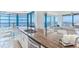 Open-concept kitchen with stainless steel appliances, granite countertops, and seamless access to the living room at 1520 Gulf Blvd # 1602, Clearwater Beach, FL 33767