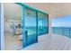 Bright living room with ocean view and access to balcony with sliding glass doors at 1520 Gulf Blvd # 1602, Clearwater Beach, FL 33767
