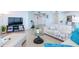 Spacious living area with comfortable seating and stylish decor, bathed in natural light at 1520 Gulf Blvd # 1602, Clearwater Beach, FL 33767
