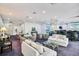 Spacious resident lounge offering multiple seating arrangements and a serving bar at 1520 Gulf Blvd # 1602, Clearwater Beach, FL 33767