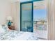 Bright main bedroom with access to a private balcony with ocean views at 1520 Gulf Blvd # 1602, Clearwater Beach, FL 33767