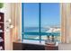 Close up view of the ocean from the office, with beachside buildings in the distance at 1520 Gulf Blvd # 1602, Clearwater Beach, FL 33767