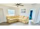 Living room featuring a large sectional sofa at 208 Pennsylvania Ave, Osprey, FL 34229