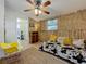 Bedroom with daybed and bamboo wall covering at 2606 46Th S St, Gulfport, FL 33711