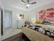 Bedroom with queen bed, closet, and unique headboard at 2606 46Th S St, Gulfport, FL 33711
