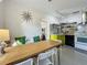 Bright kitchen features a breakfast nook, modern appliances, and stylish cabinetry at 2606 46Th S St, Gulfport, FL 33711