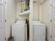 Laundry room with washer, dryer, and extra storage at 2606 46Th S St, Gulfport, FL 33711