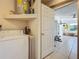 Laundry room with washer, dryer, and access to home gym at 2606 46Th S St, Gulfport, FL 33711