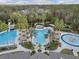 Resort-style pool with waterslide and a separate kiddie pool at 27544 Kirkwood Cir, Wesley Chapel, FL 33544