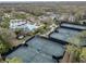 Aerial view of community tennis courts and pool area at 27544 Kirkwood Cir, Wesley Chapel, FL 33544