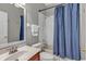 Clean bathroom with a shower/tub combo, vanity, and updated fixtures at 27544 Kirkwood Cir, Wesley Chapel, FL 33544