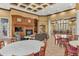 Spacious clubhouse with fireplace, comfortable seating, and multiple dining areas at 27544 Kirkwood Cir, Wesley Chapel, FL 33544