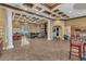 Spacious community room with fireplace and seating areas at 27544 Kirkwood Cir, Wesley Chapel, FL 33544