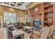 Elegant community room featuring a fireplace and comfortable furniture at 27544 Kirkwood Cir, Wesley Chapel, FL 33544