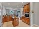 Island kitchen with stainless steel appliances and ample wood cabinetry at 27544 Kirkwood Cir, Wesley Chapel, FL 33544