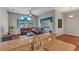 Bright living room with a comfortable sectional sofa and access to the pool at 27544 Kirkwood Cir, Wesley Chapel, FL 33544