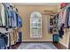 Large walk-in closet with ample shelving and hanging space at 27544 Kirkwood Cir, Wesley Chapel, FL 33544