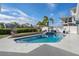 Relaxing pool area with patio and tropical landscaping at 309 Lagoon Dr, Palm Harbor, FL 34683