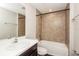 Bathroom boasts a shower/tub combo and modern vanity at 3843 Laslo Ave, North Port, FL 34287