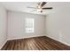 Bright bedroom with ceiling fan and window with blinds at 3843 Laslo Ave, North Port, FL 34287
