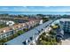 Aerial view of waterfront community with boats and resort-style amenities at 443 Pinellas Bayway S # 105, Tierra Verde, FL 33715
