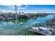 Aerial view of waterfront homes and community dock at 443 Pinellas Bayway S # 105, Tierra Verde, FL 33715