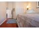 Bedroom with white bed frame and neutral bedding at 443 Pinellas Bayway S # 105, Tierra Verde, FL 33715