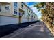Townhouses with attached garages and parking area at 443 Pinellas Bayway S # 105, Tierra Verde, FL 33715