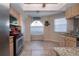 Eat-in kitchen featuring a corner window and tiled floor at 443 Pinellas Bayway S # 105, Tierra Verde, FL 33715