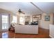 Comfortable living room with hardwood floors and fireplace at 443 Pinellas Bayway S # 105, Tierra Verde, FL 33715