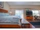 Spacious main bedroom with wood floors and private access to balcony at 443 Pinellas Bayway S # 105, Tierra Verde, FL 33715