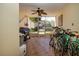 Screened porch with tile floor, ceiling fan and storage for bikes at 443 Pinellas Bayway S # 105, Tierra Verde, FL 33715