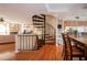 Elegant spiral staircase connecting two floors at 443 Pinellas Bayway S # 105, Tierra Verde, FL 33715