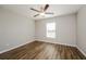 Bedroom with ceiling fan and large window at 5127 Tower St, North Port, FL 34291