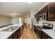 Modern kitchen with stainless steel appliances and island at 5127 Tower St, North Port, FL 34291