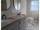 Double vanity bathroom with granite countertop and marble floor at 5198 40Th S St, St Petersburg, FL 33711
