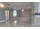 Bright and airy living room with marble-look floors and plenty of natural light at 5198 40Th S St, St Petersburg, FL 33711