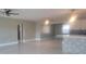 Open living room with tile floors and kitchen island at 5198 40Th S St, St Petersburg, FL 33711