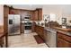 Modern kitchen with stainless steel appliances and granite countertops at 529 Harbor Ridge Dr, Palm Harbor, FL 34683